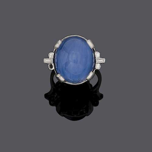 CEYLON STAR SAPPHIRE  AND DIAMOND RING, ca. 1930.