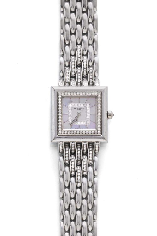 DIAMOND LADY'S WRISTWATCH, PATEK PHILIPPE. White gold 750. Ref. 4866/120G-001, Gondolo model. Square case No. 4076675 with brilliant-cut diamond lunette and diamond-set crown. Mother-of-pearl dial with diamond centre, white gold indices and hands. Quartz movement No. 1654048/4076675, Cal. E15. Gold band decorated with numerous diamonds and with fold-over clasp. Total weight of the diamonds 1.17 ct. D 25 x 25 mm. With case and Certificat d'Origine, January 2000.