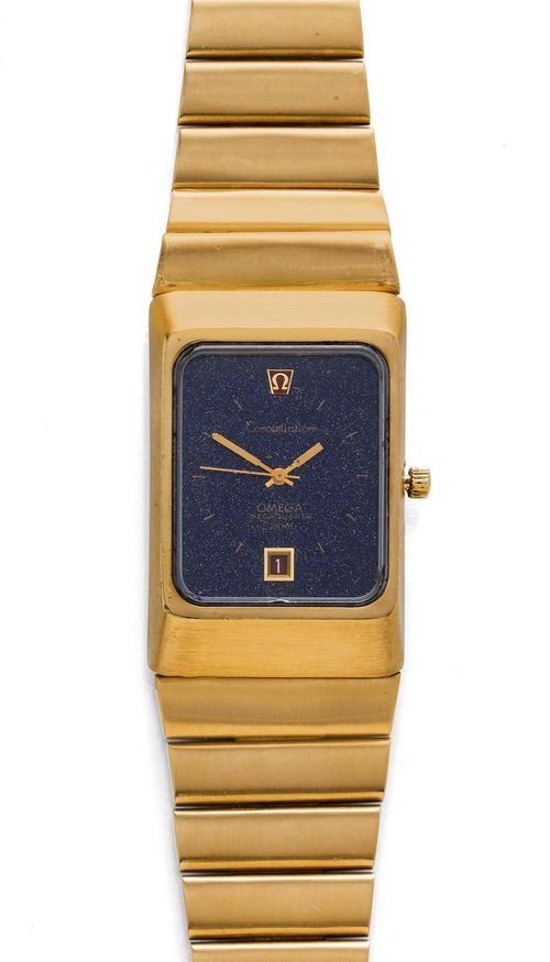 GENTLEMAN'S WRISTWATCH, OMEGA CONSTELLATION, MEGAQUARTZ, ca. 1972. Yellow gold 750, 197g. Ref. 196.0013. Rectangular, matte-finished, tall case No. 0172, with screw-down back. Blue, coloured sunstone dial -"Star-Dial"- with painted indices, gold-coloured hands, applied red Omega logo, and red date window at 6h. Mineral glass, with scratches and small chips at the edge. Quartz movement No. 34912272, Cal. 1510. Solid, matte-finished gold band with fold-over clasp. D 49 x 32 x 12 mm. At the time, Cal. 1510 was famous for its very high precision.