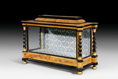 SHRINE, Baroque, probably German circa 1700. Walnut in veneer, partly ebonized and finely inlaid with strapwork, leaves and decorative frieze. Glazed on three sides. 76x30x50 cm. Provenance: Segal collection, Basel.