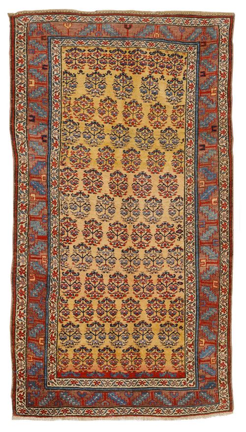 BIDJAR antique.Yellow central field patterned throughout with floral medallions, red edging, 130x240 cm.