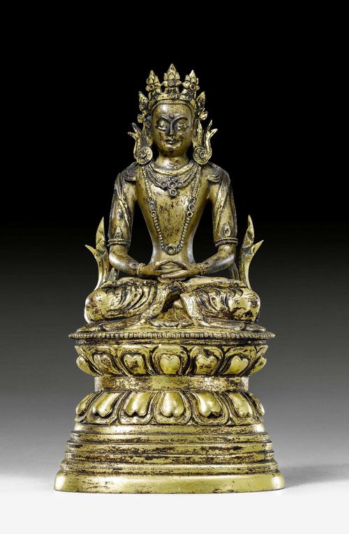A PARTLY GILT BRONZE FIGURE OF AMITAYUS SEATED ON A HIGH LOTUS THRONE. Tibeto-chinese, 18th c. Height 15.5 cm. Kalasha and consecration plate lost.
