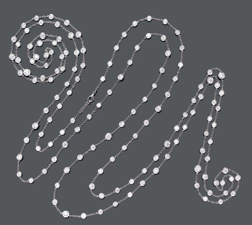 DIAMOND SAUTOIR. White gold Very decorative, long anchor chain, decorated with 144 brilliant-cut diamonds of different sizes and weighing ca. 26.20 ct, in total, in fine ring settings. Swivel clasps. L ca. 151 cm.