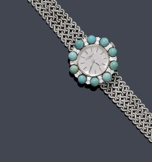TURQUOISE AND DIAMOND LADY'S BRACELET WATCH, L.U. CHOPARD, ca. 1972. White gold 750, 37g. Round case, lunette set with 10 turquoise beads of 4 - 4.5 mm Ø and 20 brilliant-cut diamonds weighing ca. 0.60 ct. Silver-coloured dial, indices and hands, signed L.U. Chopard Genève. Hand winder. Braided, original gold band, signed L.U.C. L ca. 17 cm. With copy of invoice, February 1972.