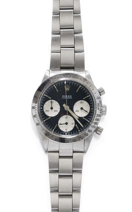 GENTLEMAN'S WRISTWATCH, ROLEX COSMOGRAPH DAYTONA, ca. 1967. Steel. Ref. 6239 and 6263 on the back. Matte-finished, tonneau-shaped case No. 2046750 with tachymeter lunette graduated from 50 to 200, round, spring-loaded chrono pushers, screw-down crown, screw-down back. Plexiglas. Black dial with silver-coloured, recessed, engine-turned 30 minute and 12 hour counters, small second, appliquéd baton indices with luminous dots, outer minute/chronograph division, baton hands with tritium, signed Rolex Cosmograph Daytona, -T Swiss T- at 6h. Mechanical chronograph, hand winder, lever escapement with Breguet spring, beryllium balance with Cal. 722-1, microstella fine adjustment, KIF shock absorber, signed. Oyster band with fold-over clasp, Ref. 7835 19. D 36.8 mm.