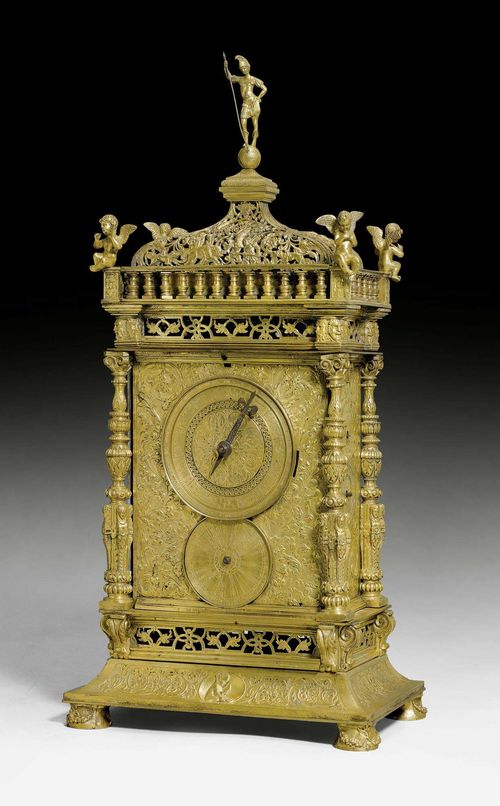 LARGE BRACKET CLOCK, Renaissance, the movement ca. 1570 and possibly by J. METZGER (Jeremias Metzger, 1538 Augsburg ca. 1595), the later housing from the 19th century with coat of arms of the BAVARIAN DUKES from the 19th century, probably Augsburg or Munich. Bronze and brass, gilt. The base with depictions of Saint Joan and the Evangelists. Fine iron movement, converted to pendulum, with strike on 2 bells. Requires servicing. 26x18x55.5 cm. Provenance: private collection, Suisse romande.