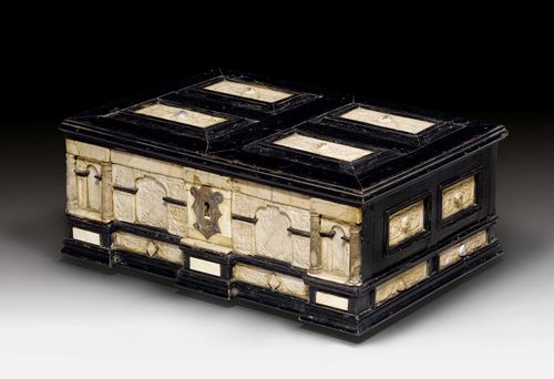 BOX, Baroque, so-called "Römhilder Kästchen", Thuringia ca. 1630/50. Ebonized soft wood and alabaster and bone in relief. Rectangular body with panelled hinged cover, on rectangular feet. The inside with 3 drawers and finely painted paper. 2 secret drawers next to one another, visible when pulling out the left wall. Iron lock and mounts. 39.5x27.5x16 cm. Provenance: - from a German collection.