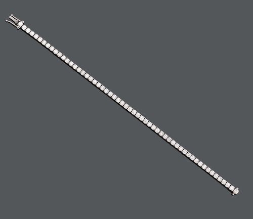 DIAMOND BRACELET. White gold 750. Set with brilliant-cut diamonds, weighing ca. 6.40 ct. L ca. 18 cm.