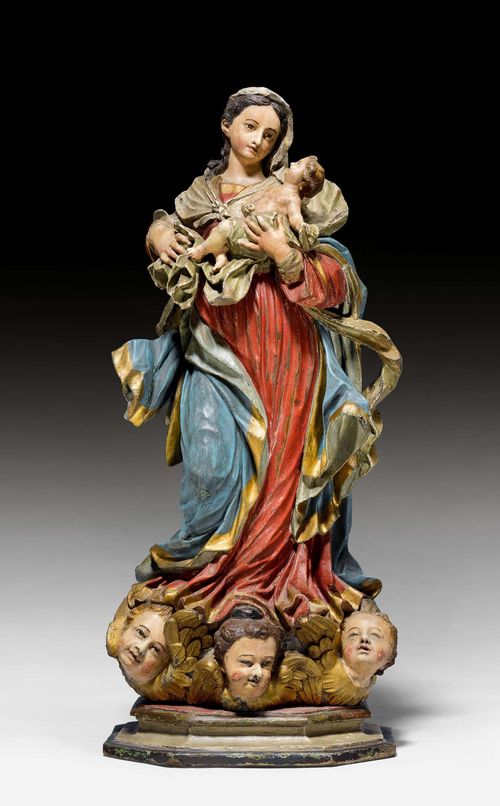 MADONNA  WITH THE CHRIST CHILD ON A CLOUD BASE, Southern Italy ca. 1700. Wood, carved all around and painted. Painting, not original. H 70 cm. Provenance: - from a Swiss private collection.