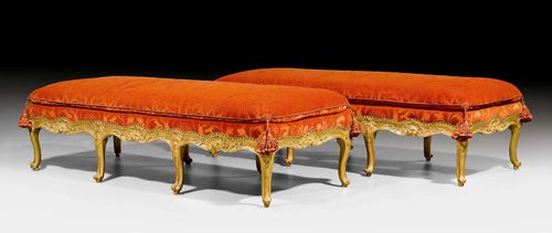 PAIR OF BANQUETTES, Louis XV, Northern Italy, probably Piedmont ca. 1750/60. Walnut, opulently carved with shells, leaves and decorative frieze and gilt. Orange velour cover with bullen nails. Cushion. 170x70x36 cm. Provenance: - from a European collection.