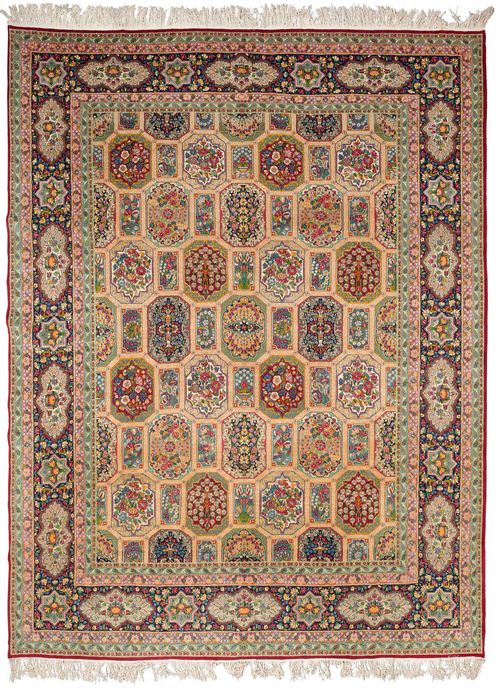 KIRMAN old.Colourful central field with floral cartouches, dark blue border, in good condition, 309x393 cm.