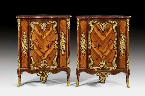 PAIR OF PRINCELY ENCOIGNURES, Louis XV, signed MIGEON (Pierre II and IV Migeon, ma&#238;tre 1739), guild stamp, Paris ca. 1750. Purpleheart, amaranth and &quot;bois de violette&quot; in veneer, inlaid in &quot;bois de bout&quot;; flowers, leaves and decorative frieze. Front with 1 door. Exquisitely fine matte and polished gilt bronze mounts and sabots. Both bear brands from  the collection of the Duc de Penthi&#232;vre. Profiled &quot;Griotte Rouge&quot; top. The legs restored and raised. 79x54x98 cm. Provenance: - from the collection of the Duc de Penthi&#232;vre. - by inheritance in the A. Demidoff Collection, Principe di San Donato, ca. 1870. - from the collection of Prince Paul of Yugoslavia, Villa Demidoff, Pratolino. - Auction Sotheby&#39;s &quot;in situ&quot;, Villa Demidoff, Pratolino, 22 April 1969 (Lot No. 268). - from a private collection, Dallas. - from an English collection.