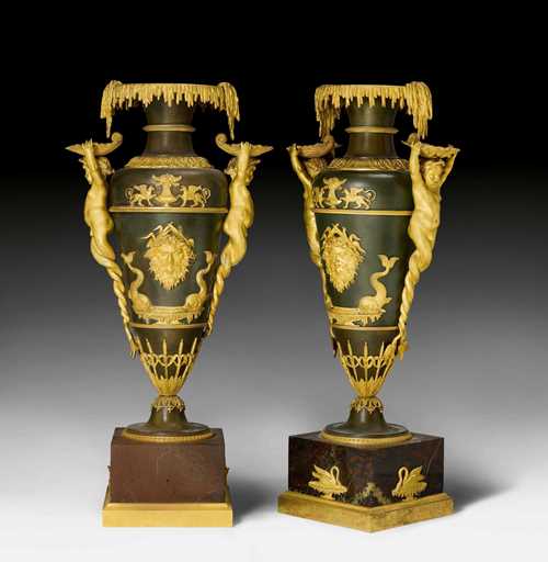 PAIR OF IMPORTANT ORNAMENTAL VASES &quot;AUX ENFANTS&quot;, Empire, attributed to F. BERGENFELDT (Friedrich Bergenfeldt, 1768-1822), probably after designs by A. VORONIKHINE (Andrej Voronikhine, 1760-1814), St. Petersburg ca. 1805/10. Gilt and burnished bronze and dark red marble. Gilt mounts and applications designed as shells, reeds, fish, mascarons with reed wreaths, swans, griffins and leaf frieze. H 56 cm. Provenance: - from a Swiss private collection.