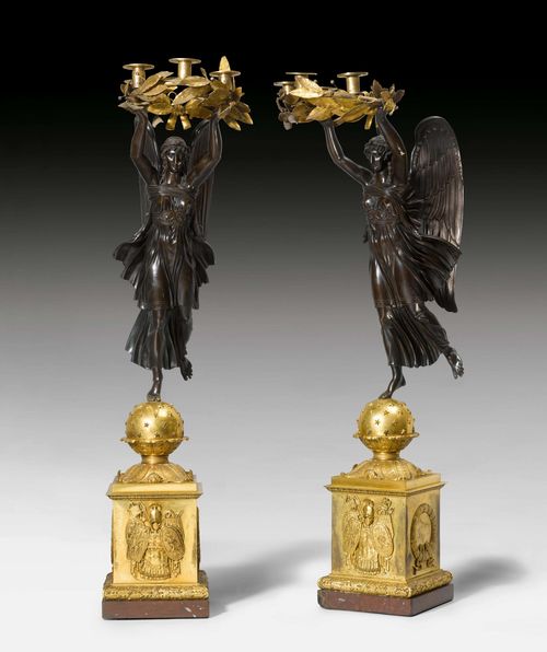 PAIR OF IMPORTANT CANDELABRAS &quot;AUX VICTOIRES&quot;, Empire, in the style of P.P. THOMIRE (Pierre Philippe Thomire, 1751 Paris 1843), Paris ca. 1810. Gilt and burnished bronze and &quot;Griotte Rouge&quot; marble. Gilt mounts and applications. Some losses. H 116 cm and 113 cm. Provenance: - from a Swiss private collection.