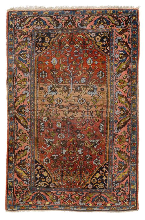 HAMADAN antique. Rust coloured ground with stylized plant motifs, red edging, signs of wear, 130x200 cm.