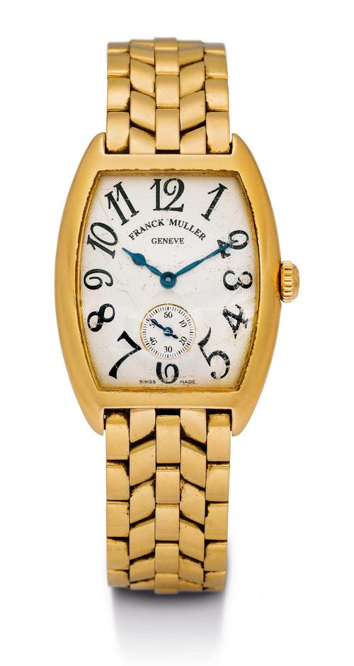 FRANCK MULLER LADY'S WRISTWATCH, CINTREE CURVEX, ca. 2000. Yellow gold 750. Ref. 7500 S6. Tonneau-shaped case No. 35. Screw-down back, curved sapphire glass. Engine-turned, silver-plated dial with Arabic numerals and small second at 6h. Blued hands. Hand winder. Gold band with double fold-over clasp. D 29 x 39 mm.