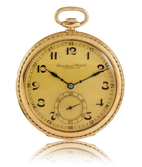 IWC DRESS WATCH, ca. 1930S. Yellow gold 585. Flat, profiled case No. 812299. Gold-coloured dial with black, Arabic numerals and blued hands, small second at 6h. Crown winding, precision bridge movement with compensation balance, Breguet spring and swan neck regulator. Minute wheel bearing in screwed gold chaton. D 50 mm.