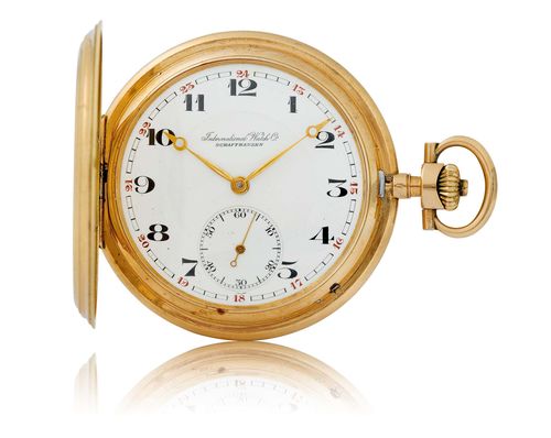 IWC SAVONNETTE, ca. 1930s. Yellow gold 585. Flat, engine-turned case No. 820293, blank monogram cartouche, gold dust cover signed: International Watch Co. Schaffhausen. White enamel dial with black, Arabic numerals, gold Breguet hands and small second at 6h. Gold-plated 2/3 plate movement No. 795661 with compensation balance, Breguet spring and swan neck regulator, minute wheel bearing in gold chaton. D 53 mm.