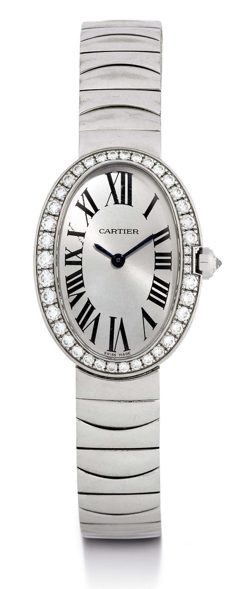 CARTIER BAIGNOIRE DIAMOND LADY'S WRISTWATCH, 2011. White gold 750. Ref. CRWB520006. Elegant, oval, rhodium-plated case No. 135437NX 3065, with diamond-set lunette and crown, convex sapphire glass. Rhodium-plated dial with printed Roman numerals, blued hands. Quartz movement. White gold band with double fold-over clasp. D 32 x 23 mm. With original Cartier box and invoice.