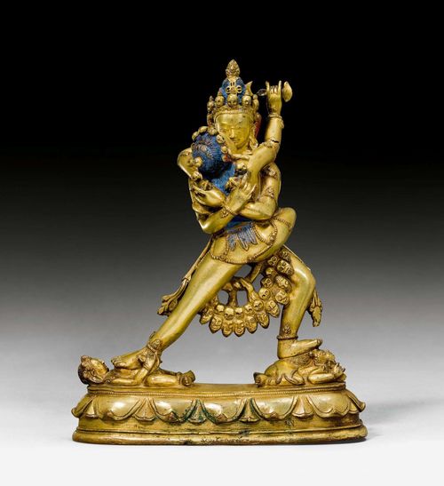 A GILT COPPER FIGURE OF SAMVARA WITH HIS PAREDRA YAB-YUM. Tibet, 18th c. Height 22 cm. Sealed. Crack at arm.