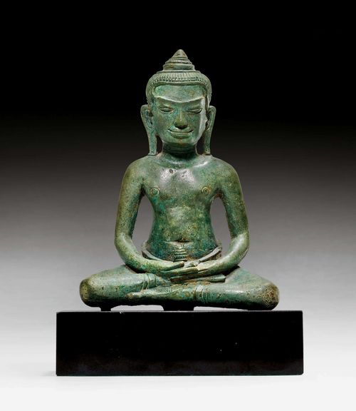 A SMALL BRONZE  FIGURE OF THE SEATED BUDDHA WITH GREEN PATINA . Khmer, Bayon style, 13th c. height 12 cm.