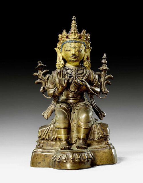 A BRONZE FIGURE OF MAITREYA SEATED IN EUROPEAN STYLE. Tibet, 19th c. Height 14.5 cm. Head painted.