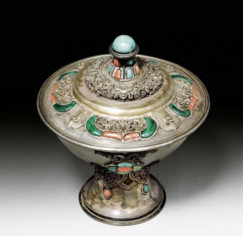 A WHITE STONE BOWL ON HIGH SILVER FOOT WITH COVER. Mongolia/China, 19th c. Height 15 cm. Coral, malachite and turquoise inlays.