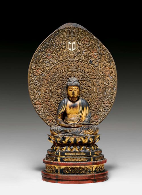 A LACQUER GILT WOOD FIGURE OF THE SEATED AMIDA NYÔRAI. Japan, Edo period, height 33 cm (without the replaced aureole).