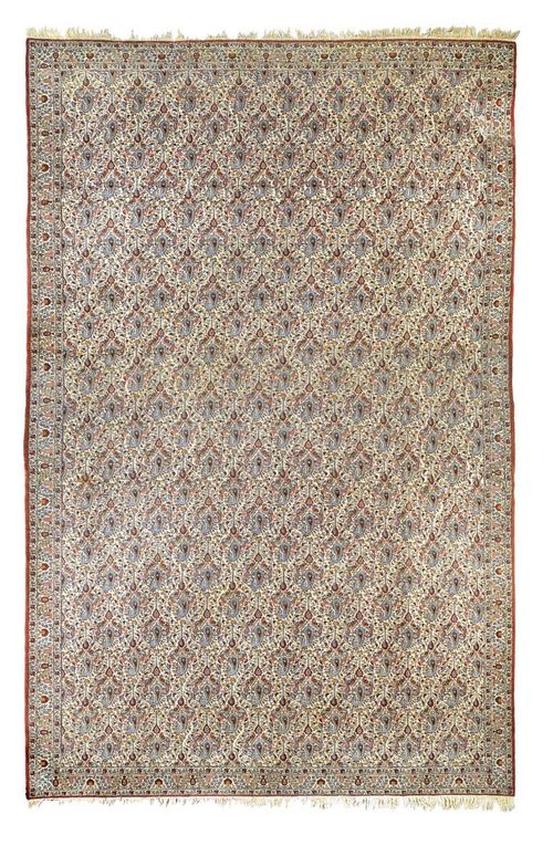 GHOM old.White central field patterned throughout with boteh motifs in light blue and red, white border, restored, slight wear, 555x335 cm.