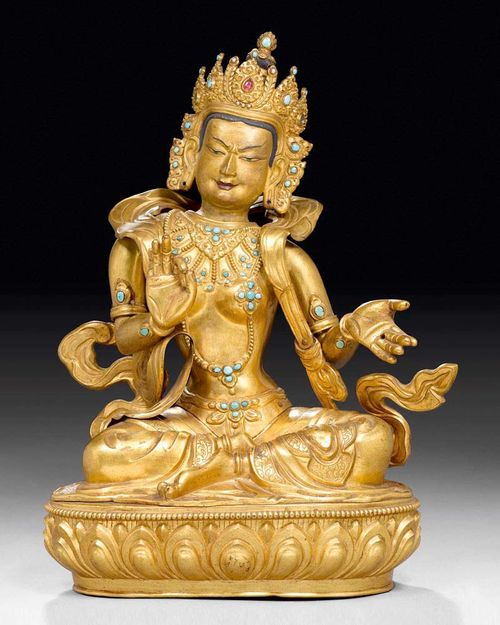 TARA.Tibet, 19th century H 36 cm. Chased gilt copper. The jewellery decorated with small turquoises and the crown with a ruby red stone.