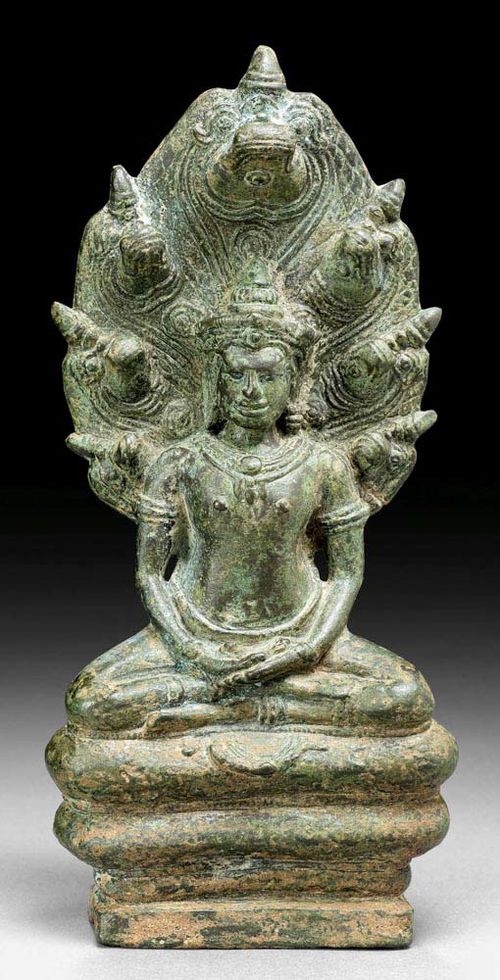 BUDDHA MUCHALINDA.Khmer, 12th century  H 19.5 cm. Bronze.