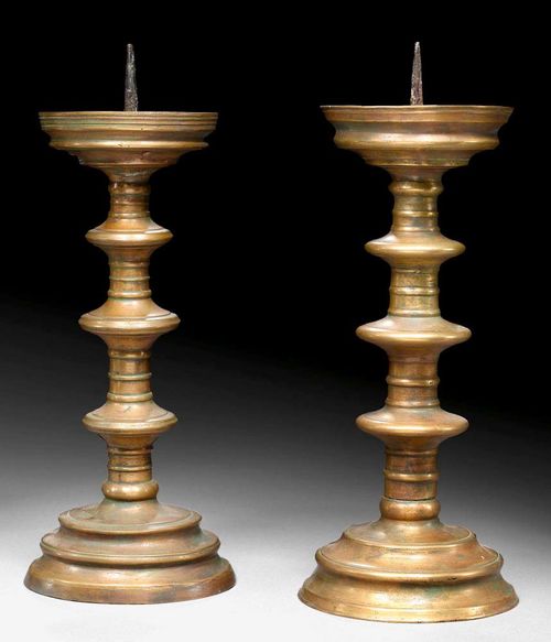 PAIR OF BRONZE CANDLE HOLDERS,early Baroque, German, 18th century H 39 cm.