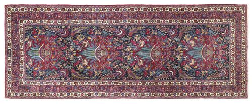 MESHED SABER old.Blue central field with four medallions. The entire carpet is opulently patterned with colourful plant motifs. Red border. Good condition. 210x534 cm.