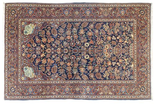 KESHAN antique.Dark blue mihrab with red spandrels, finely patterned with vases in attractive pastel colours, red border with trailing flowers, slight wear, 137x205 cm.