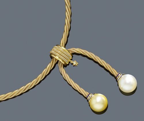 GOLD, PEARL AND DIAMOND NECKLACE, WELLENDORF. Yellow gold 750, 76g. Fancy necklace of corded gold wire. The pendant, Utopia model, is adorned with 2 South Sea cultured pearls of ca. 14 mm Ø, one white and one yellow, mounted on a removable clip eyelet, additionally decorated with small brilliant-cut diamonds weighing ca. 0.32 ct and blue enamel. Signed Wellendorf. L ca. 42.5 cm. With copy of insurance estimate.