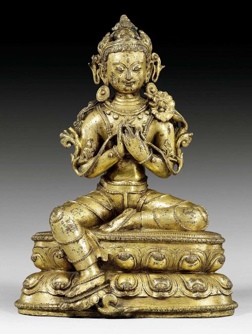 A GILT COPPER ALLOY FIGURE OF MAITREYA SEATED IN LALITASANA. Tibet, 14th/15th c. Height 17 cm.