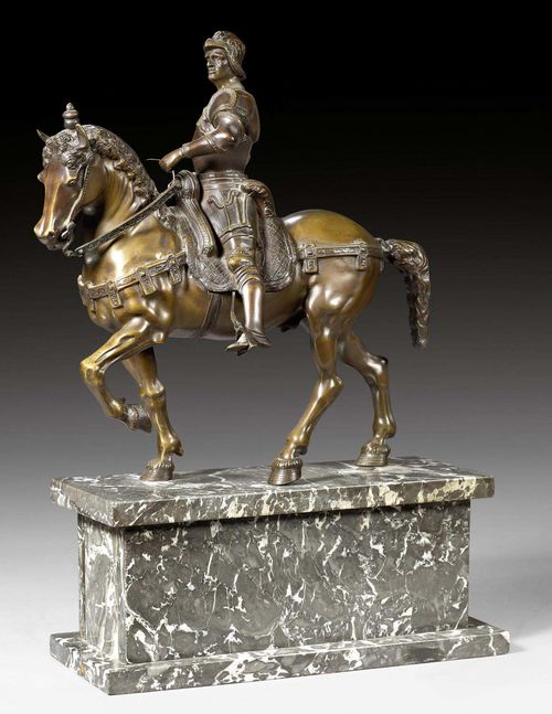 EQUESTRIAN STATUE OF BARTOLOMEO COLLEONI,after the original by A. DEL VERROCCHIO (Andrea del Verrocchio, Florence 1435-1488 Venice), Italy, 19th century. Burnished bronze and black/white veined marble. 32x13x48 cm.