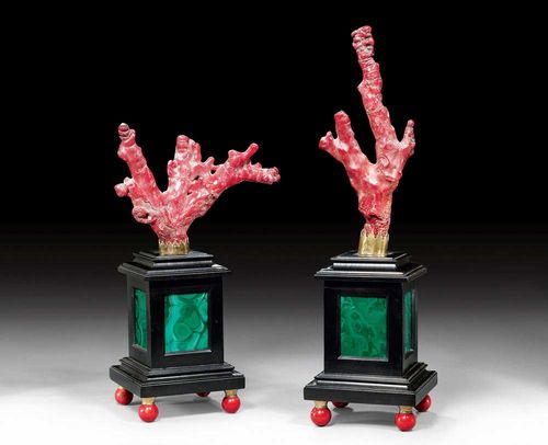 PAIR OF CORAL ORNAMENTS,Renaissance style, probably  The Netherlands, end of the 19th century Red coral, malachite and ebonised wood. H 41 and 31 cm. Provenance: from a German collection