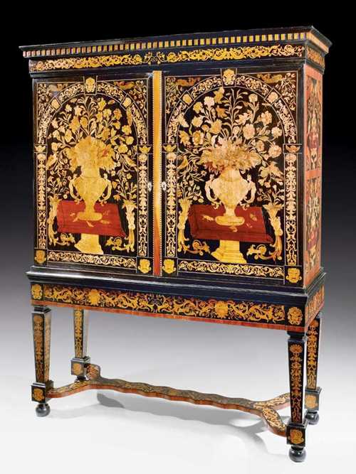 IMPORTANT CABINET WITH FLORAL MARQUETRY,Baroque , J. VAN MEKEREN (Jan van Mekeren, Tiel 1658-1733 Amsterdam) attributed, The Netherlands  circa 1695/1700. Tulipwood, purpleheart, olivewood, rosewood, sycamore and various other precious woods finely inlaid on all sides with motifs of floral bouquets, vases, consoles, birds, butterflies and frieze. With double door front and a fitted interior with drawers and ledge. Gilt bronze mounts and wooden knobs. 170x66x225 cm. Provenance: from a Paris private collection.