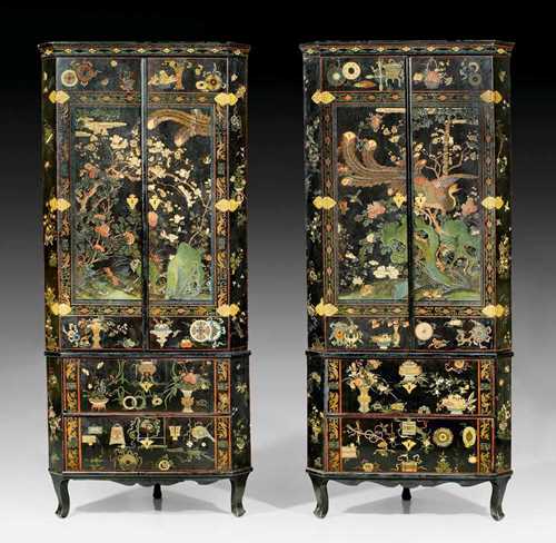 PAIR OF ROYAL COROMANDEL LACQUER CORNER CABINETS,Louis XV, the lacquer panels China, 17th century, Dresden circa 1740. Wooden cabinets with coromandel lacquer on all sides: with polychrome flowers, leaves, vases and frieze on a black ground. With double doors at the front over 2 drawers. Inscribed "1750 ... WIEN.." and "SECUNDOGENIT(UR)" under crown. 107x52x242.5 cm. Provenance: - formerly in the Royal Saxon collection. - from a German collection.