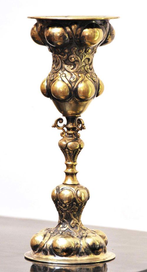 CUP,probably Augsburg, 17th century. Chased and gilt silver. H 22 cm. Embossed.