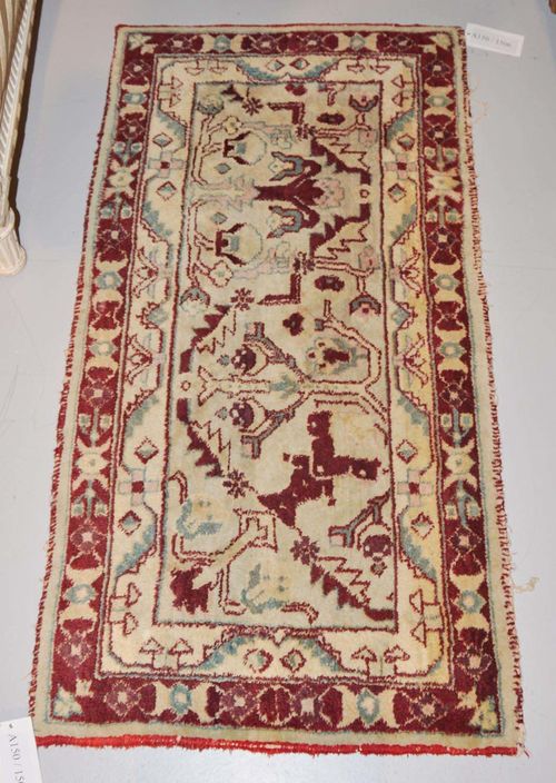 ANATOLIAN KILIM old.Horizontally striped central field with a geometric pattern in harmonious colours, white border, good condition, 190x540 cm.