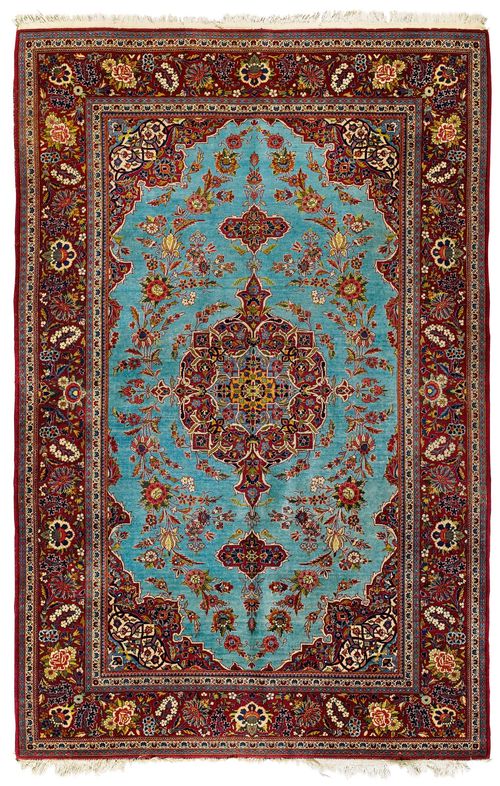 KESHAN old.Turquoise central field with a red central medallion and corner motifs, the entire carpet is patterned with trailing flowers, red flowers, slight wear, 135x205 cm.