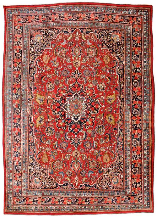 BIDJAR old.Red central field with rose medallions and blue corner motifs, the entire carpet is decorated with flowers and palmettes, blue edging with roses, good condition, 300x255 cm.