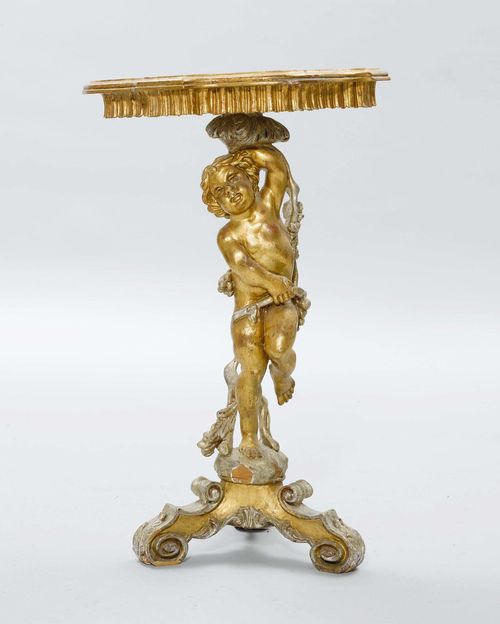 SMALL CONSOLE DESIGNED AS A PUTTO,in the Baroque style. Carved wood, gilt and silvered. On three legs with scrolled ends. 48x35x78 cm. Painting with some losses.