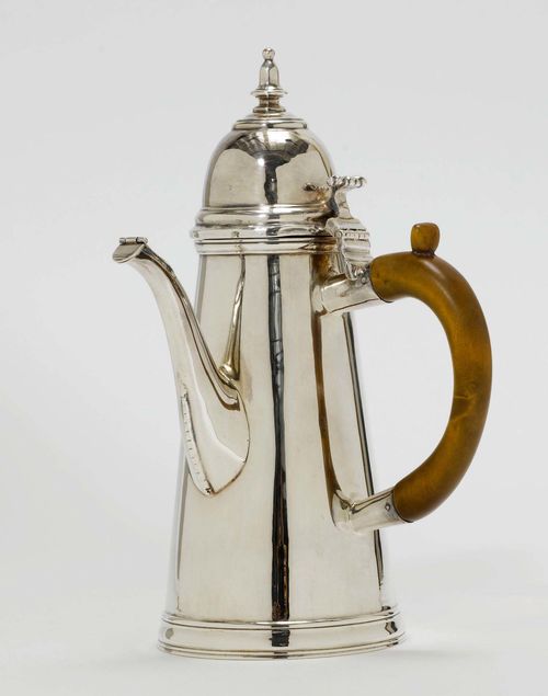 COFFEE POT,Newcastle, after 1890. High, smooth-walled and conical body. Egg-shaped lid with finial. Lateral wooden handle with pusher. H 24 cm, 603g.