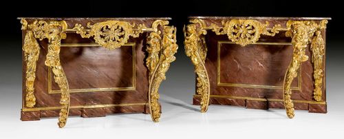 PAIR OF CONSOLES "AUX ENFANTS MUSICIENS",Louis XV, probably Rome, 19th century. Pierced, richly carved and gilt wood. Gray/pink speckled marble top. "En faux marbre" painted back wall. Gilding considerably retouched. 130x65x93 cm. Provenance: Baron Kuhlmann-Stumm collection in Schloss Ramholz, Germany.