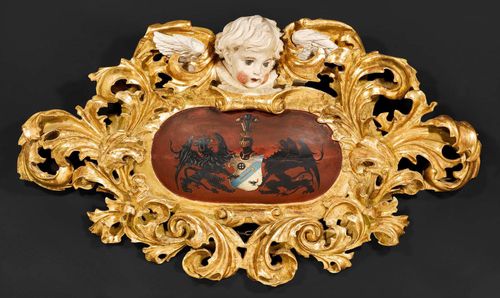 PAIR OF PAINTED ARMORIAL CARTOUCHES "AUX ANGELOTS",late Baroque, German, 19th century. Pierced and richly carved gilt wood, painted with the Stumm family coat of arms. Restored and retouched paintwork. H 86.5 cm. W 140 cm. Provenance: Baron Kuhlmann-Stumm collection in Schloss Ramholz, Germany.