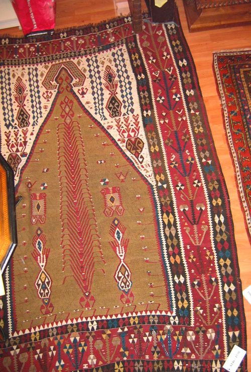KILIM ARMENIA, PRAYER old.Olive green mihrab with a tree of life and white spandrels, red border with stylized plants, good condition, 210x160 cm.