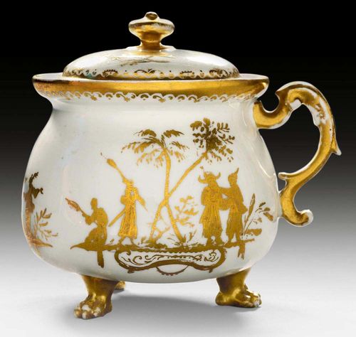 CREAM JUG AND TOP WITH CHINESE FIGURES IN GOLD, Meissen, circa 1720.Painting by the workshop of Abraham Seuter. Remains a gold mark on the underside. H 12.5cm. Gilding rubbed.